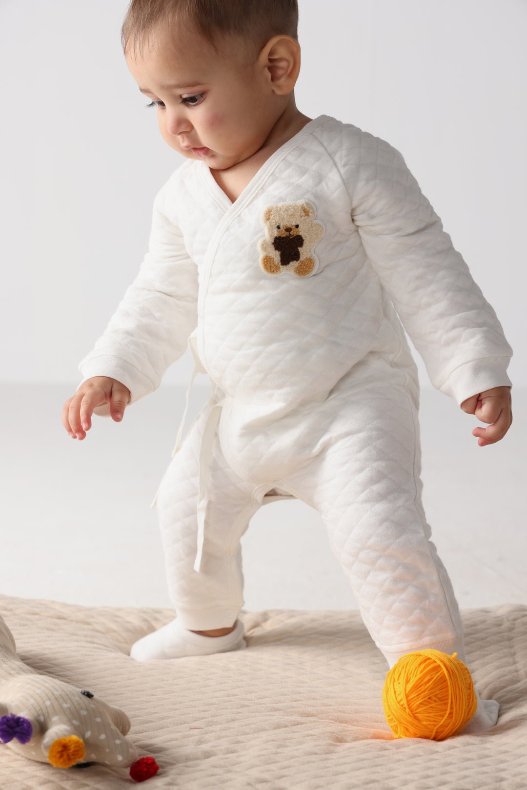 Snowy teddy onesie