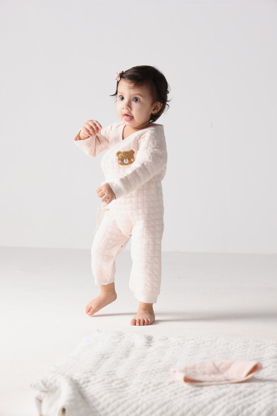 blush teddy onesie